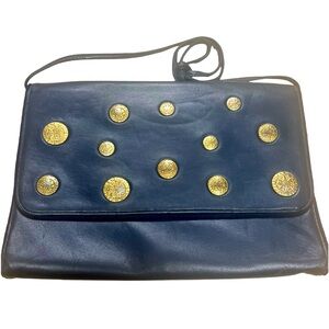 Adrienne Vittadini vintage flat X-Large clutch with strap and old coin detail